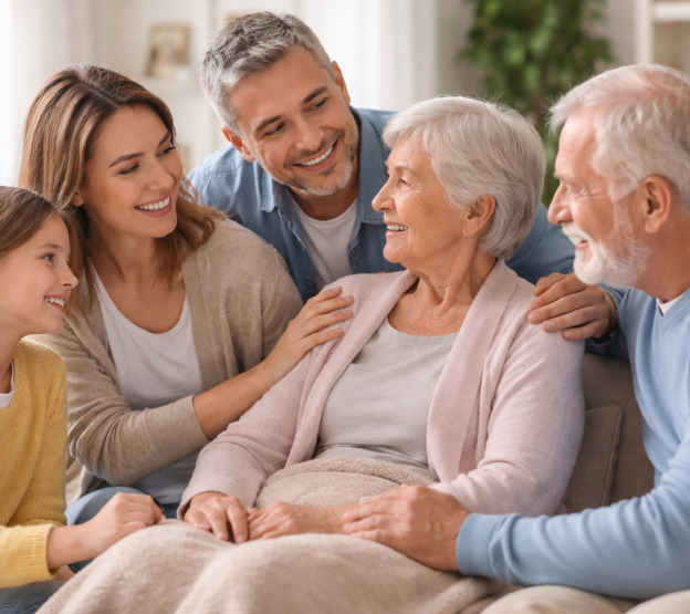 Family supporting elderly patient at home
